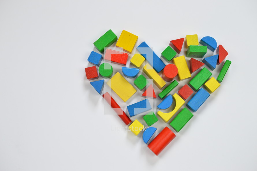 wooden blocks in the shape of a heart 