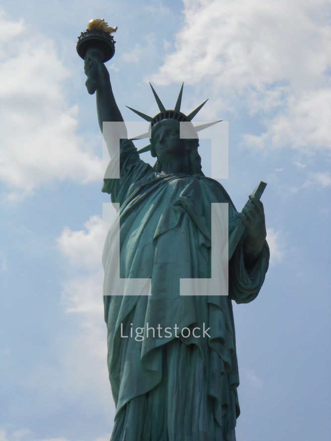 Statue of Liberty holding her torch 