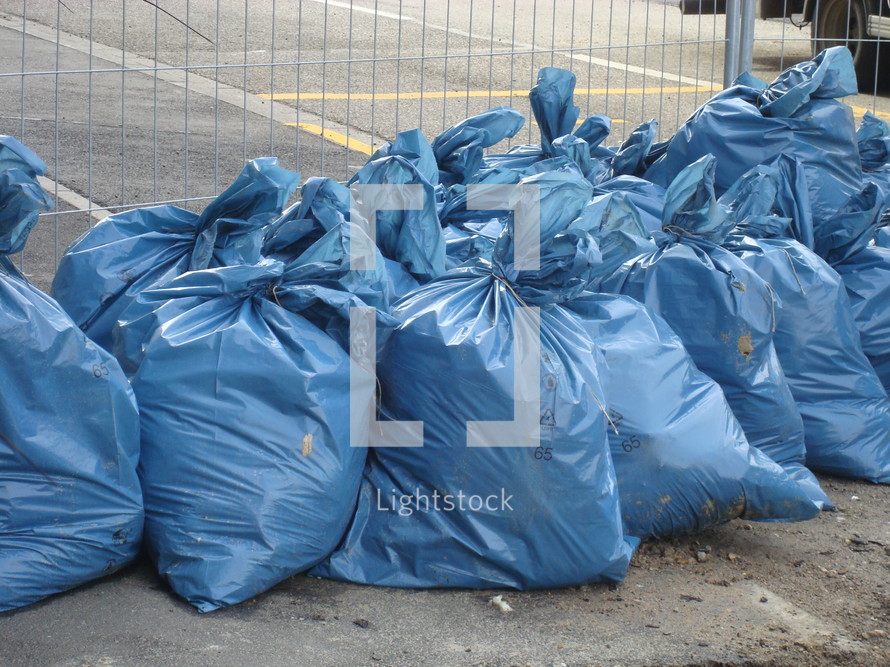 blue garbage bags, 
garbage, bags, blue, waste, profusion, prodigality, wastage, sack, bag, plastic, rubbish, trash, litter, junk, fading, evanescent, tip, dump, landfill, scrap heap, waste disposal site, Roadworks, construction, site, area