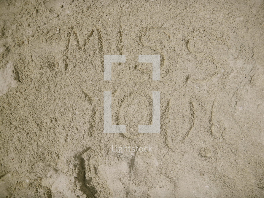 miss you written in the sand