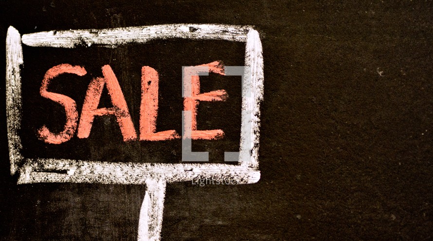 A chalk drawing of a sale sign.