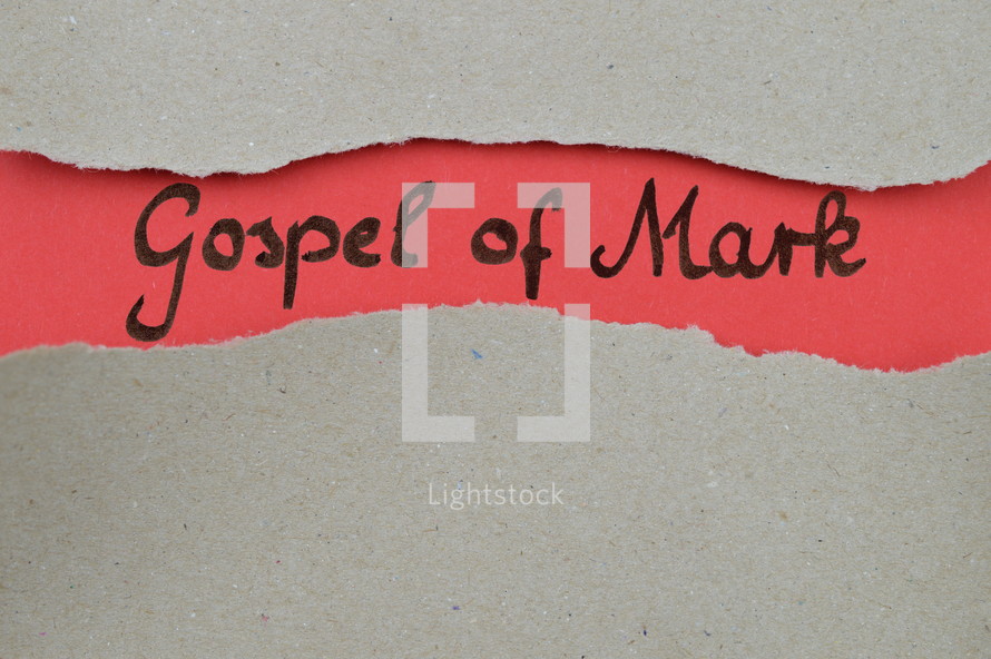 Gospel of Mark - torn open kraft paper over light red paper with the name of the Gospel of Mark