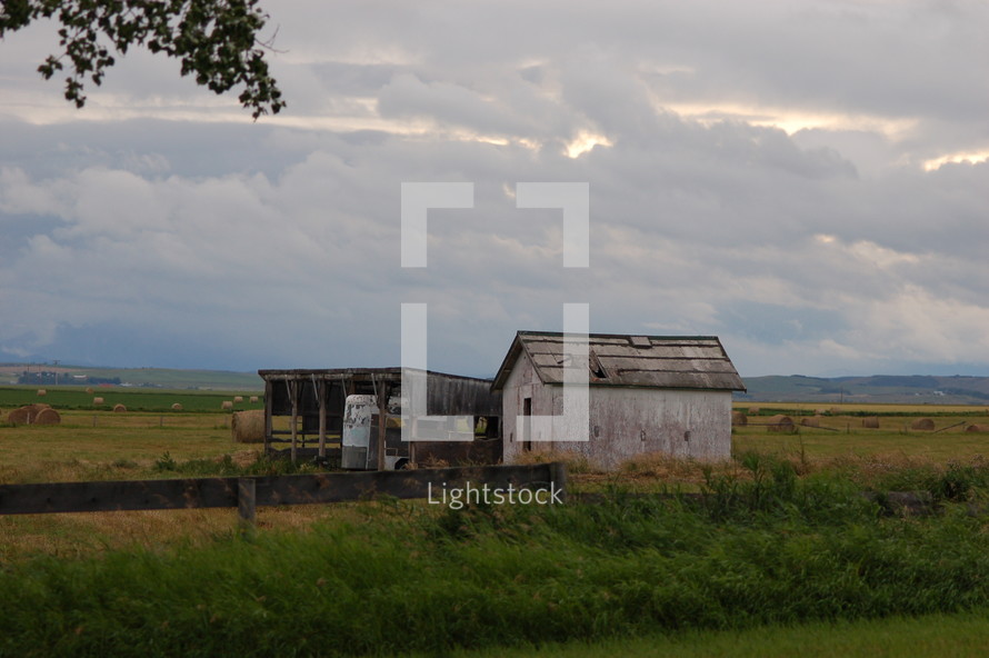 rural shed and hay bales 