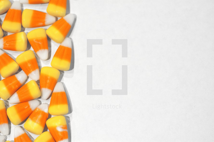 candy corn border on a white background 