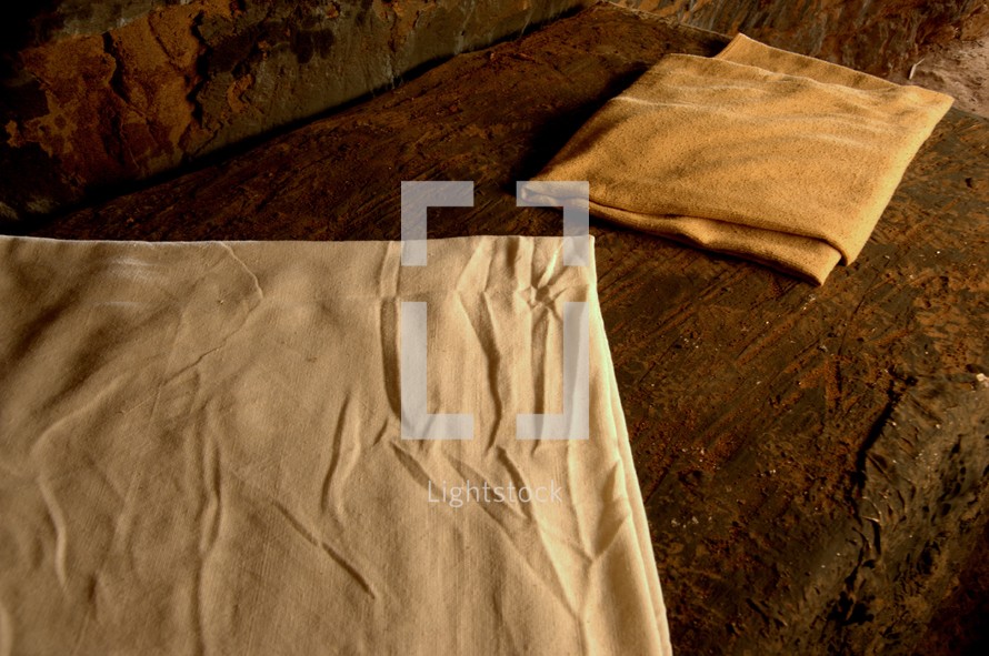 folded linens in the empty tomb