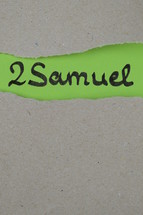 torn open kraft paper over green paper with the name of the book 2 Samuel 