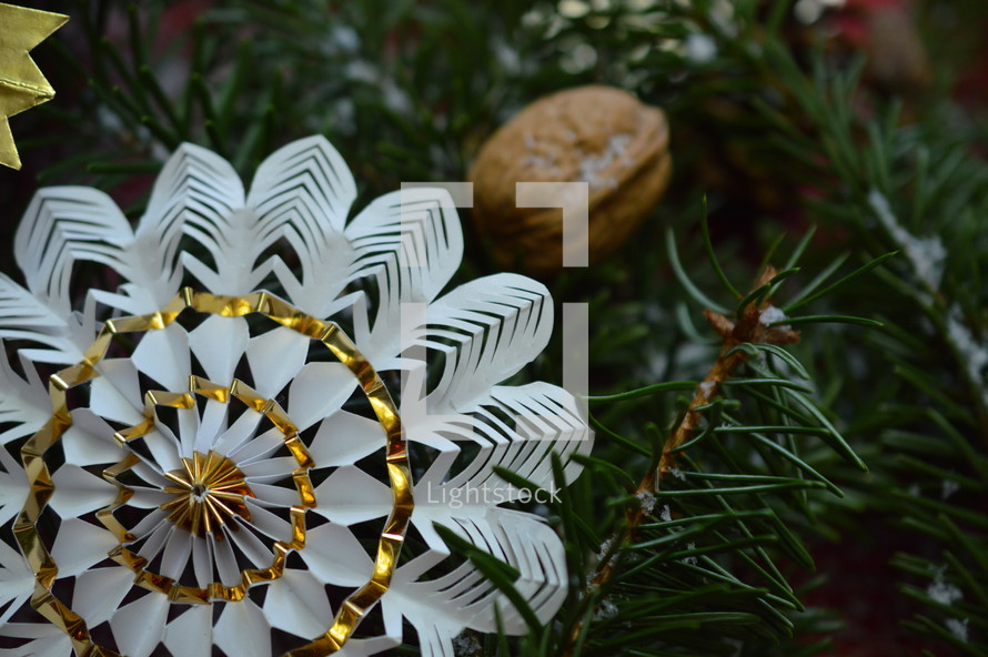 pinwheel ornament in pine garland 