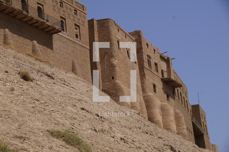 Ancient city walls around a desert city