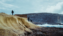 climbing cliffs along a rugged shore 