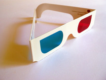 A set of paper 3D Glasses used to watch a 3D Animated movie for an animated 3D movie or 3D Film Festival.  Great for watching 3D Movies at home on a large screen television set in the dark or in a large movie theater such as an IMAX movie. 