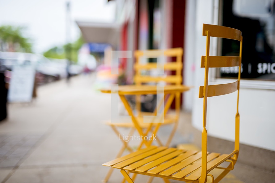 outdoor seating on a sidewalk 