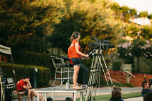 woman working the camera - videographer 