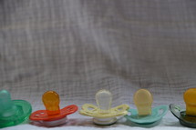Row of pacifiers.
