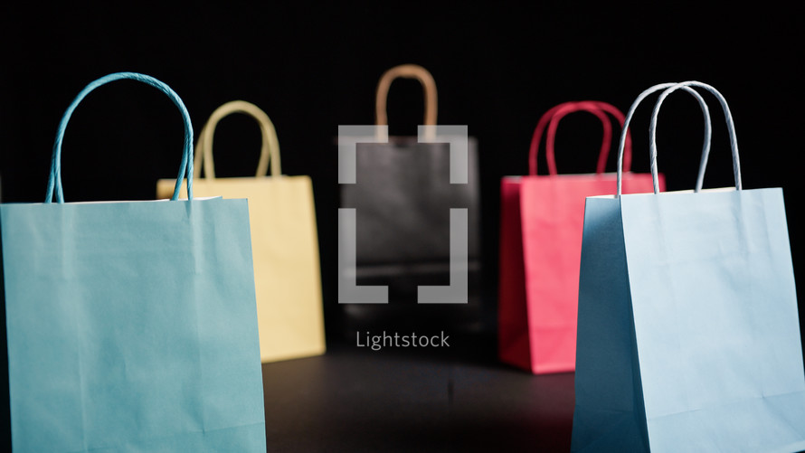 Composition of shopping bags in shop for Black Friday