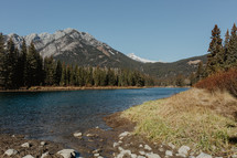 river, mountains and evergreen forest 