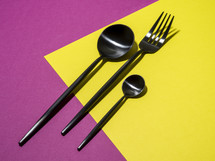 utensils on pink and yellow 