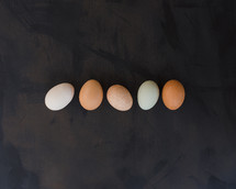 brown and white eggs 