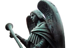Statue of an angel warrior with a trumpet.