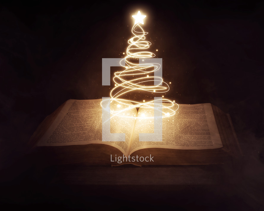 Christmas tree of lights and the pages of a Bible 