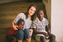 missionary hugging a child in Kenya 