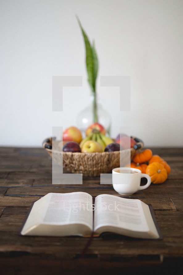 pumpkins, coffee mug, mug, basket, plums, apples, pages, Bible, open Bible, bananas, fruit, vase