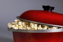 popcorn in a red pot 