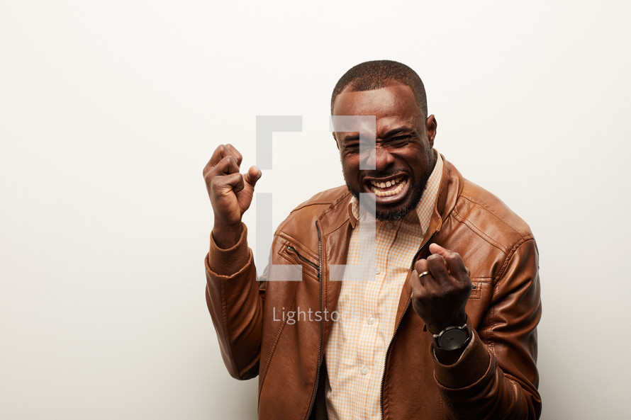 an excited African American man
