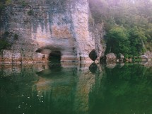 cliff caves in a river