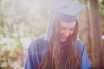 Young woman in a graduation gown