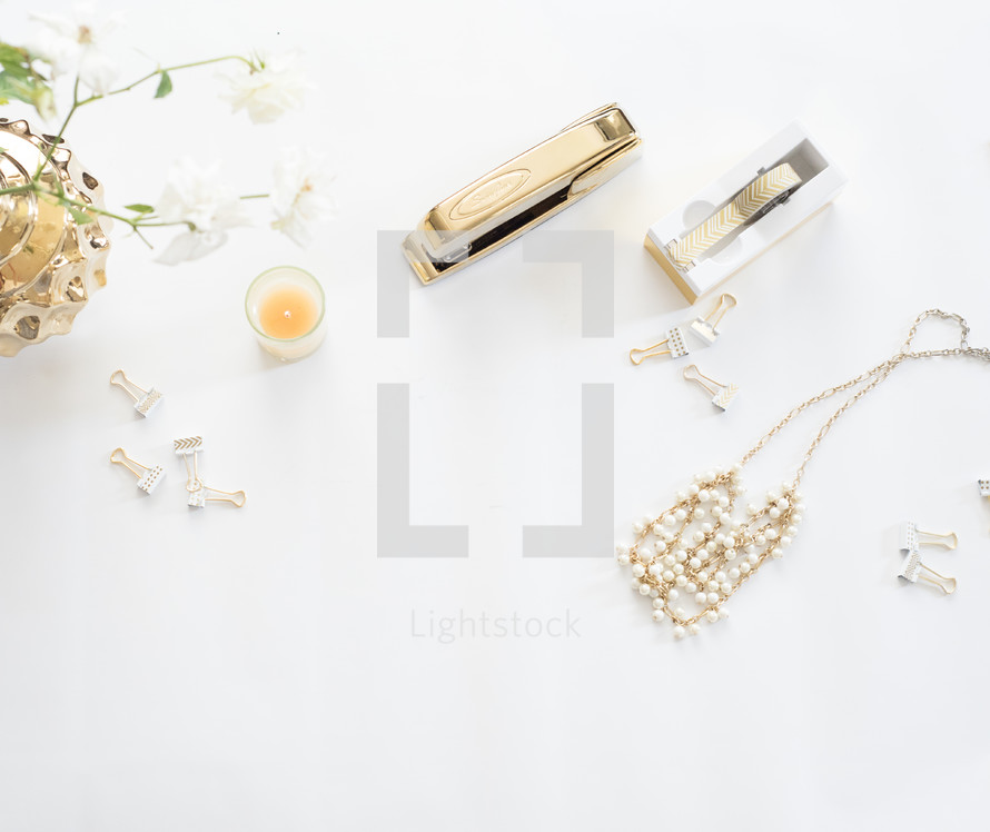 gold and white eclectic items 