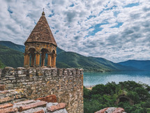 Old castle and church by the lake