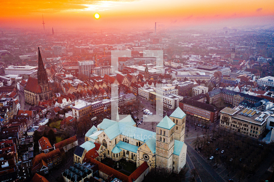 aerial view over a cathedral at sunset 