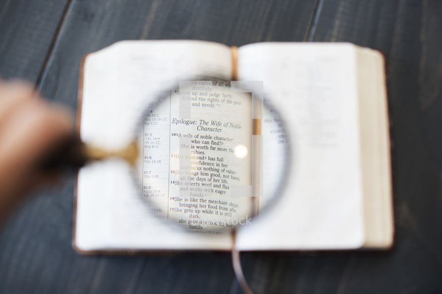 Magnifying glass on Proverbs 31 in the Bible