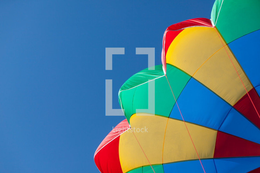 a rainbow colored parachute 