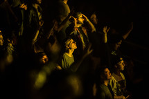 youth in the audience at a concert 