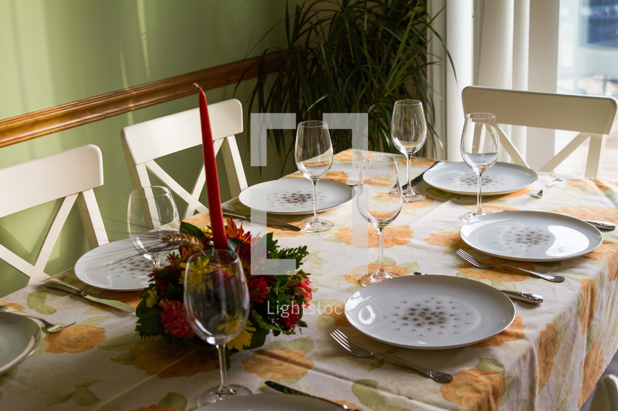 a table set for thanksgiving dinner 
