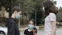 Coronavirus pandemic - kids wearing face masks to avoid contagion