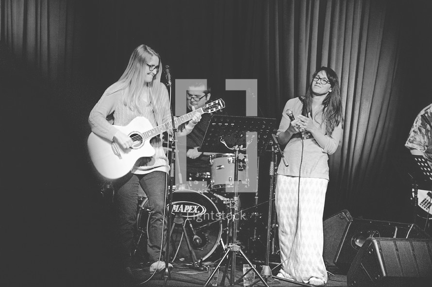 young female musicians on stage 