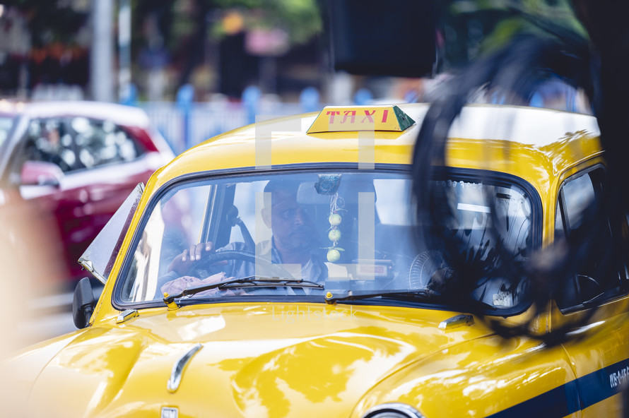 Yellow taxi in Kolkata, India.