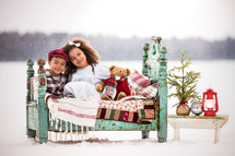 Christmas portrait of kids outdoors in winter snow 