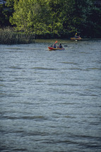 paddling canoes in water 