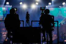videographers filming a concert 