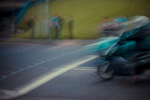Speeding motorcycle.