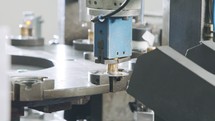 Automated assembly line for metal parts in the automotive industry
