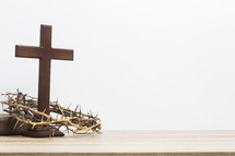 cross, crown of thorns, and white background 