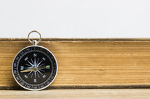 compass and Bible pages 