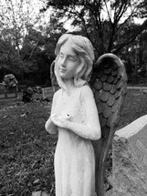 Stone angel in a graveyard