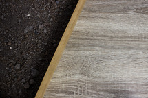 wood board on black soil 