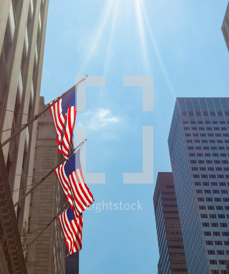 View of Fifth Avenue and American flags in New York City
