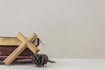 cross and Bibles on white background 